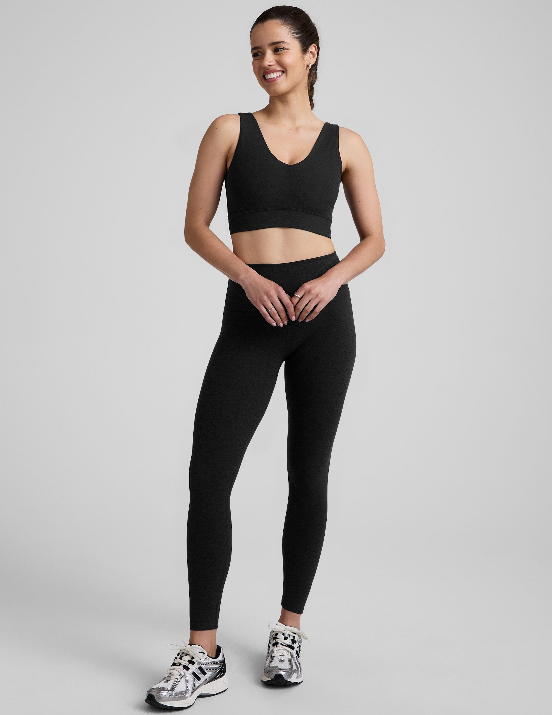 black long line style bra with a front and back v-neck.