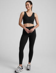 black long line style bra with a front and back v-neck.