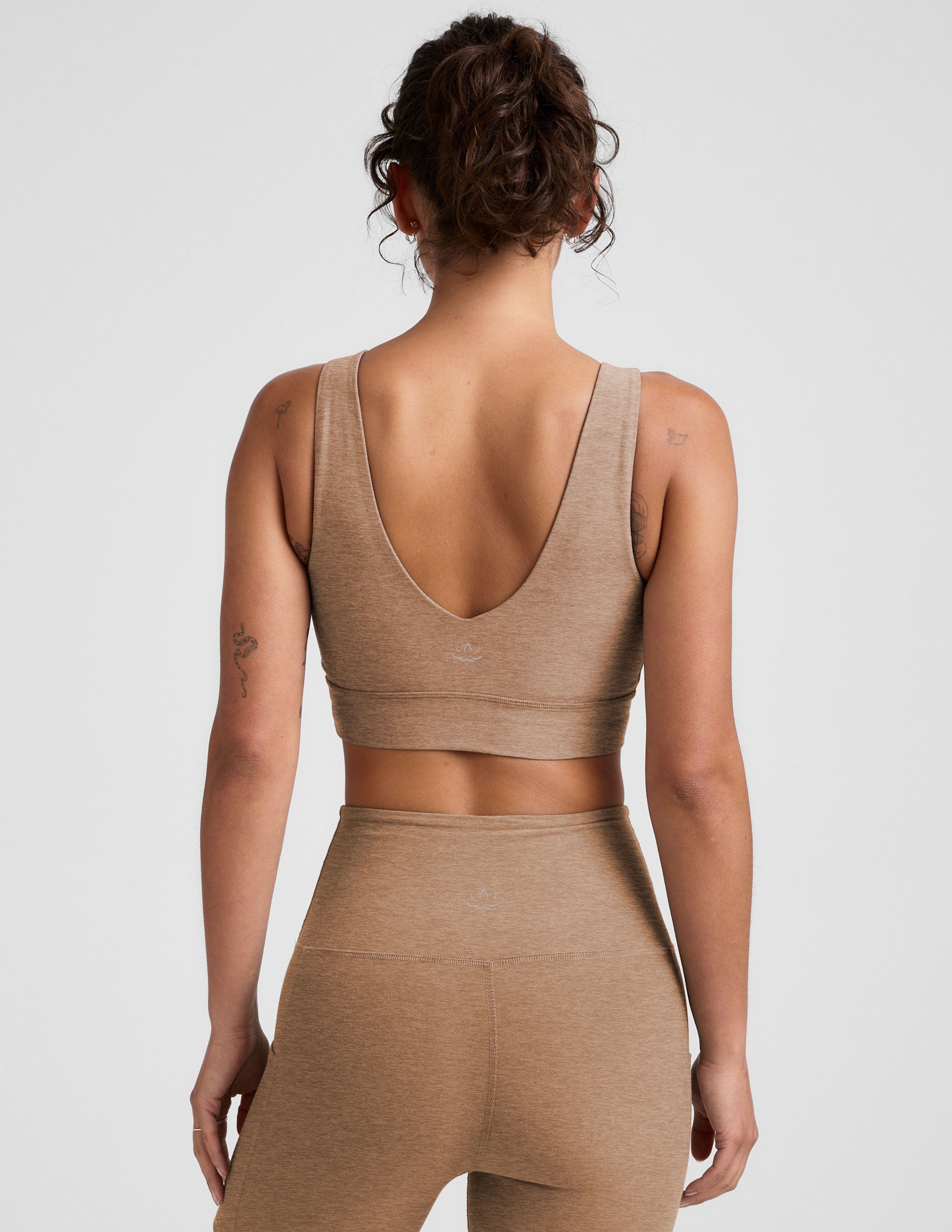 brown long line style bra with a front and back v-neck.