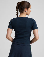 blue ribbed cropped top with a scoop neckline.