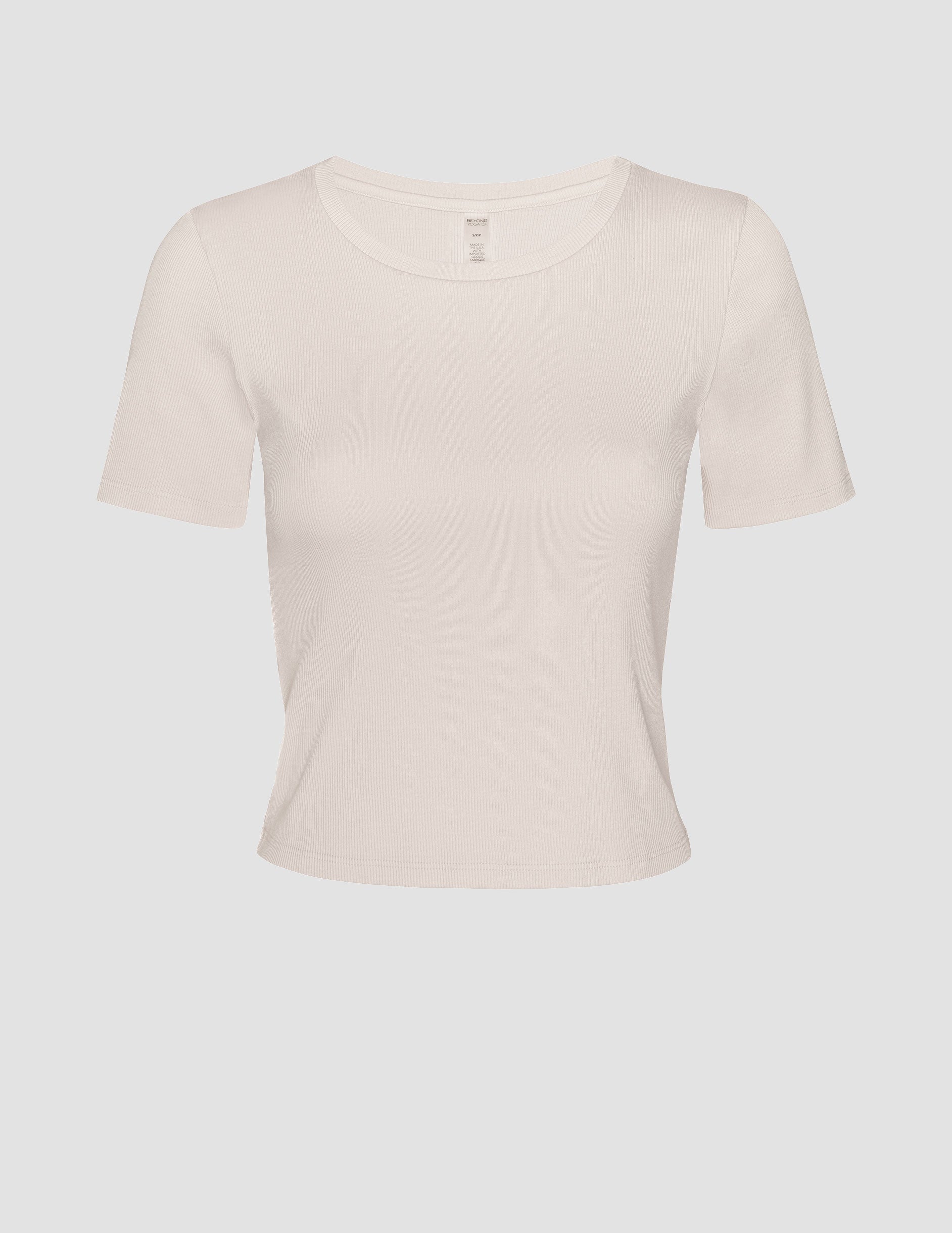 brown ribbed cropped top with a scoop neckline.