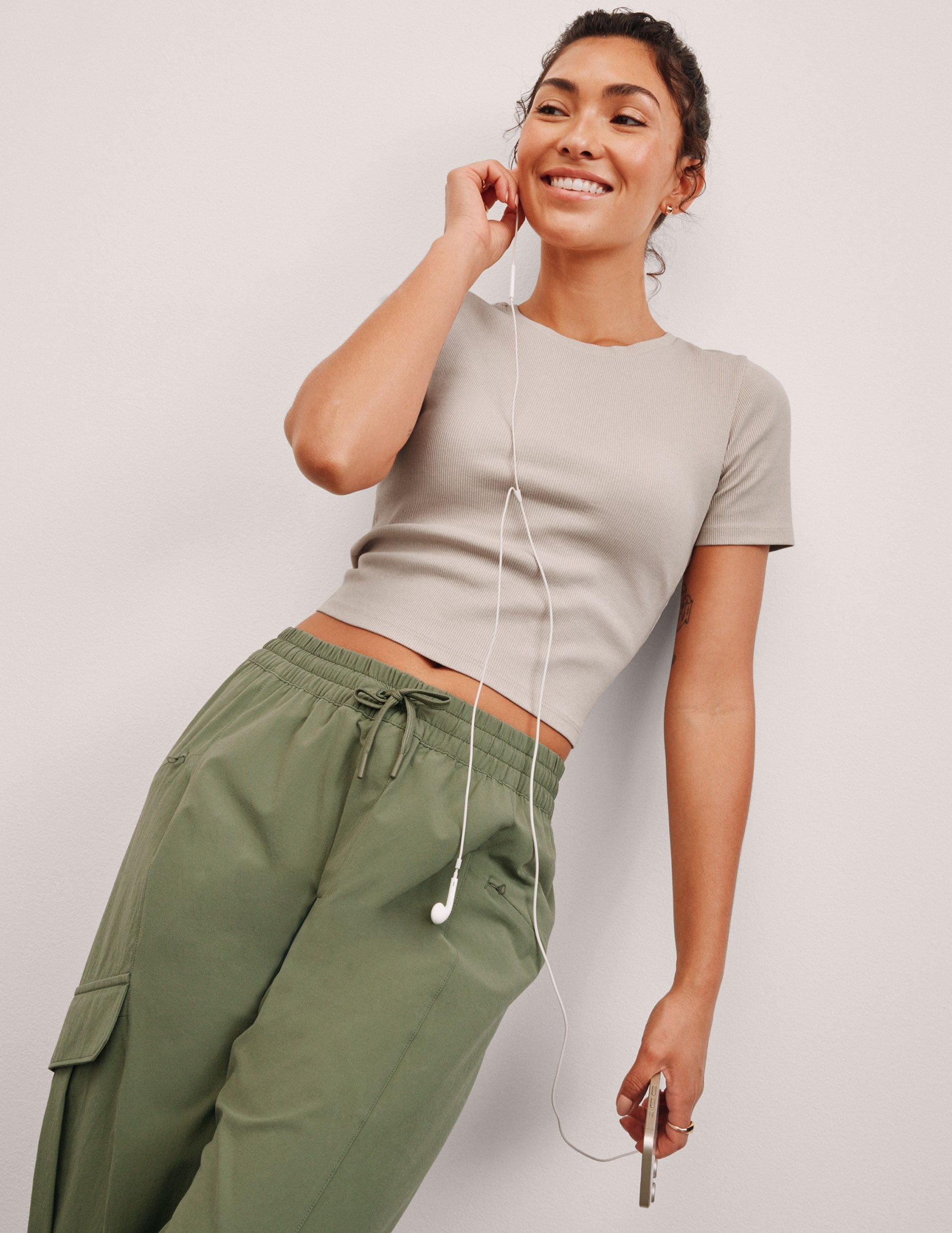 brown ribbed cropped top with a scoop neckline.