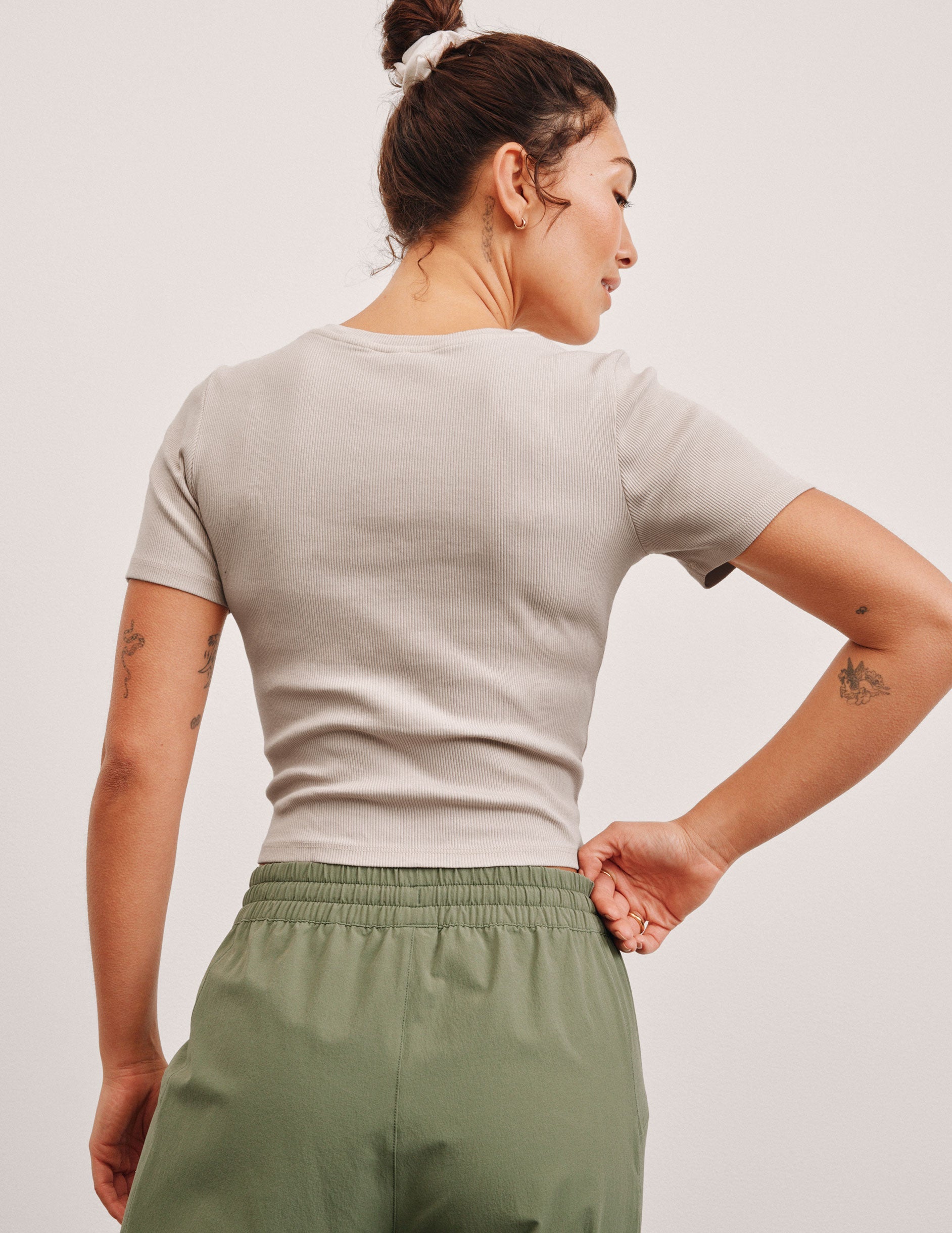 brown ribbed cropped top with a scoop neckline.