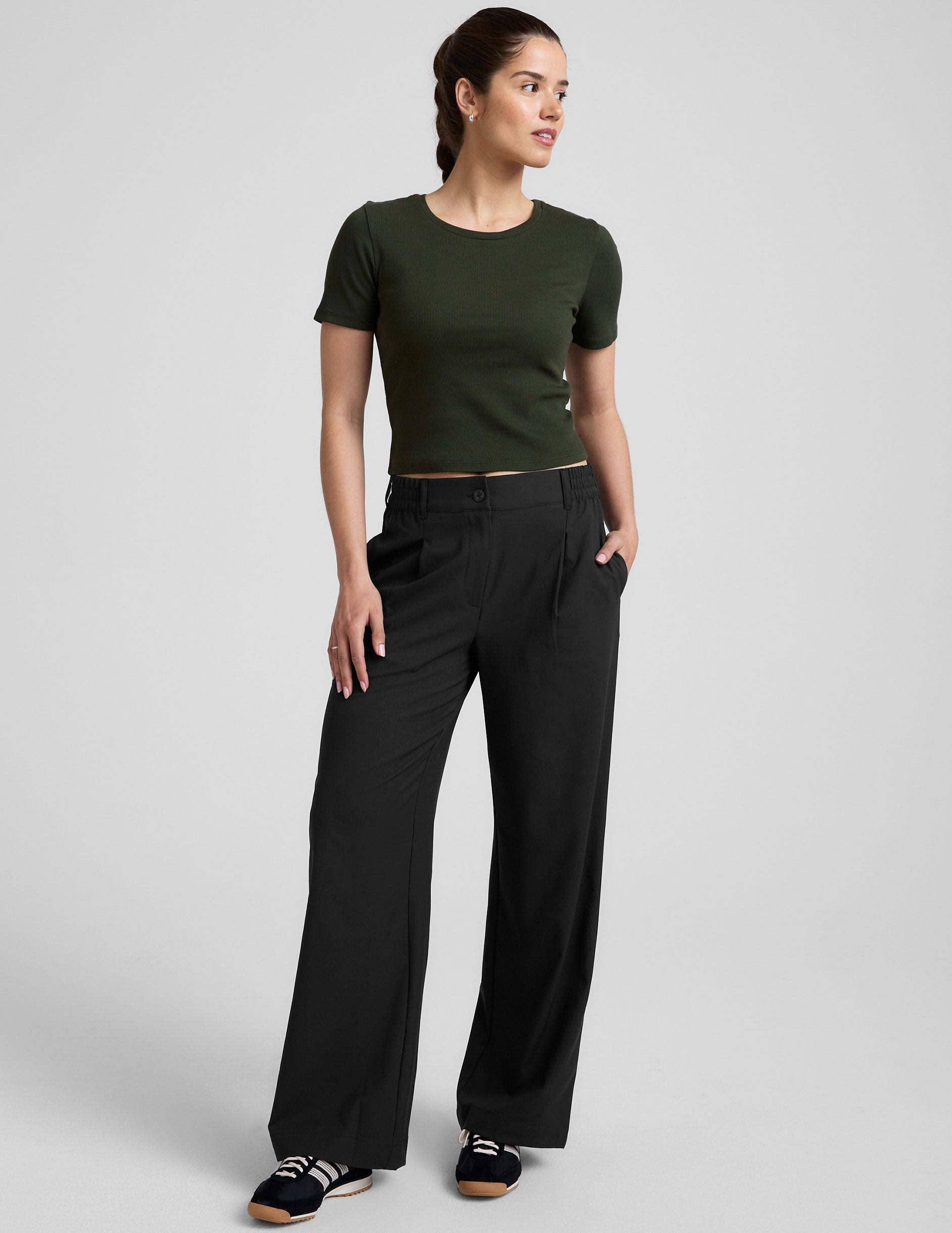 green ribbed cropped top with a scoop neckline.