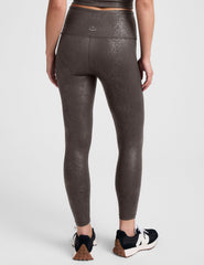 brown viper printed high-waisted midi length leggings.