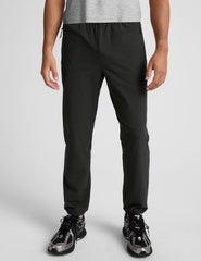 black men's joggers on a plain background.